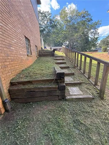a view of a bench in a yard