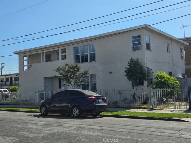 a car parked in front of a house