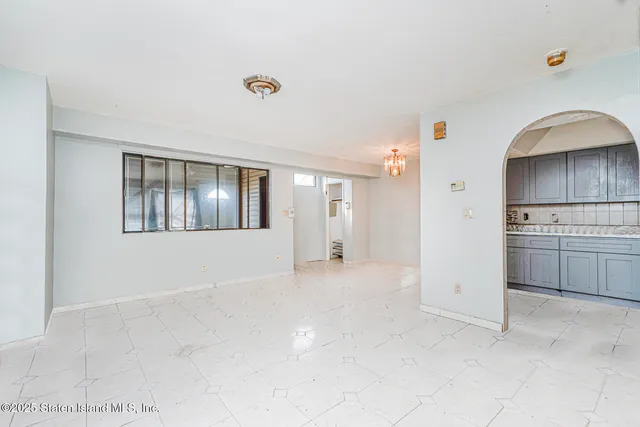 a bathroom with a sink toilet and mirror
