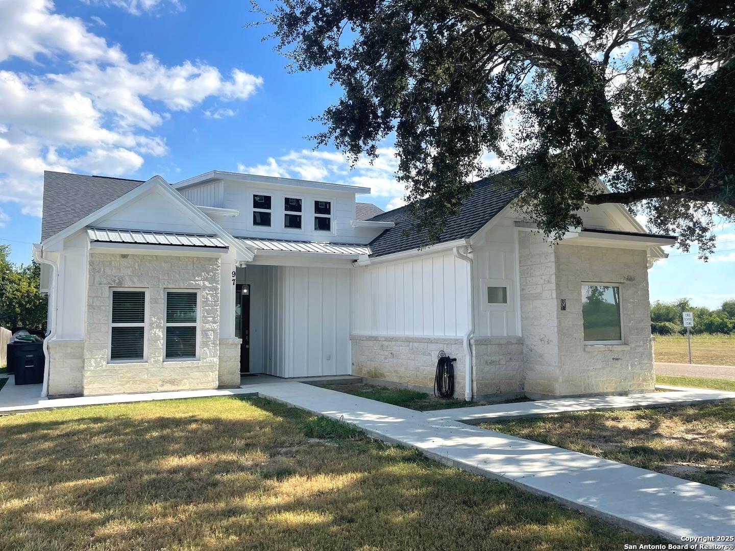 97 Berwick Road Victoria, TX 77904 - Photo 2 of 35 a front view of a house with a yard