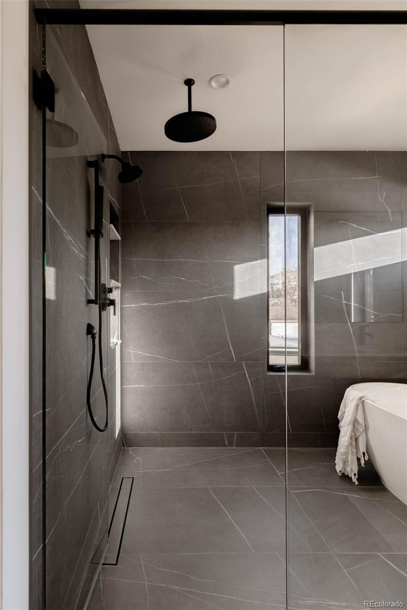 2490 Wolff Street Denver, CO 80212 - Photo 26 of 41 a bathroom with a shower