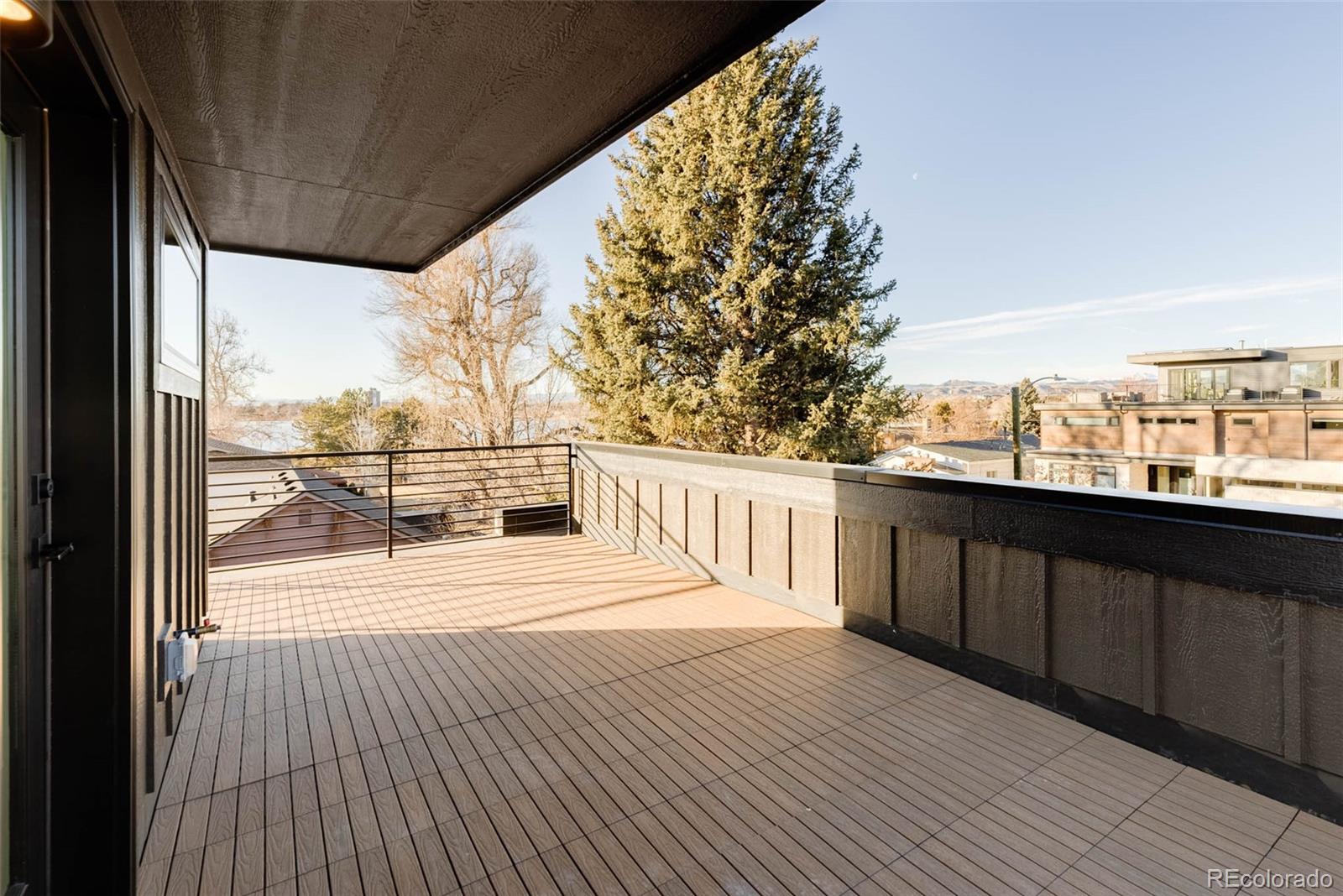 2490 Wolff Street Denver, CO 80212 - Photo 39 of 41 a view of a balcony with wooden floor