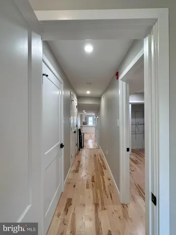 a bathroom with a shower and a sink