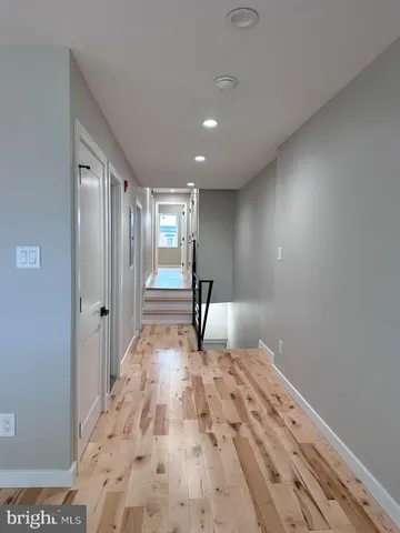 a view of a livingroom with a staircase