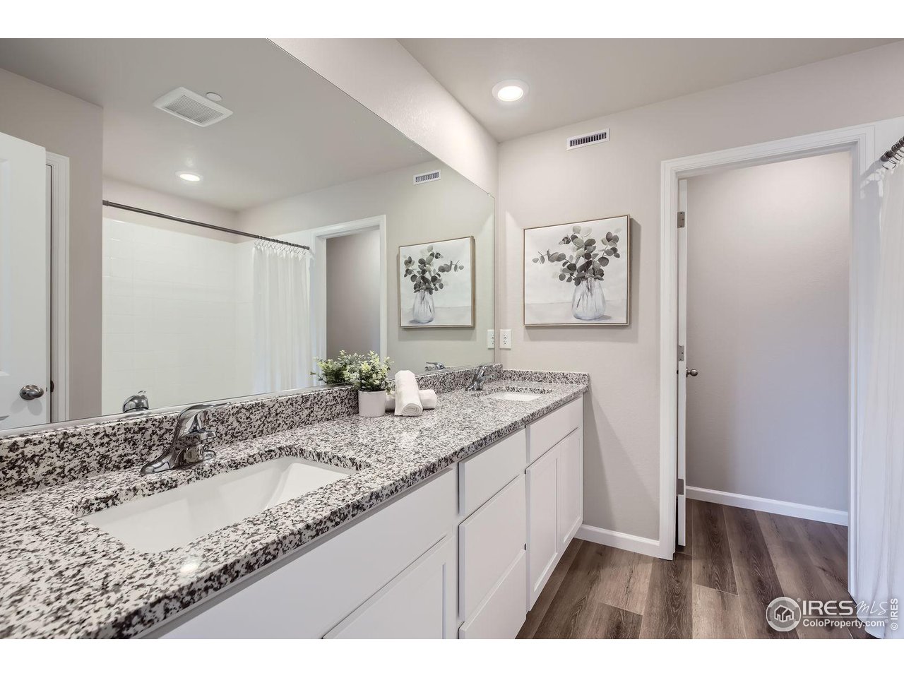 141 Robin Road Johnstown, CO 80534 - Photo 13 of 38 Primary Bath with Double Sinks