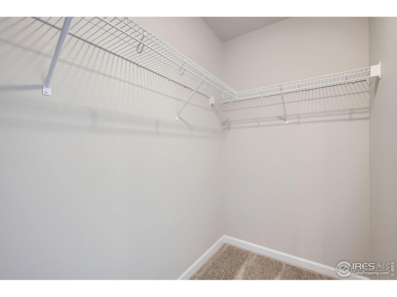 141 Robin Road Johnstown, CO 80534 - Photo 14 of 38 Primary Closet