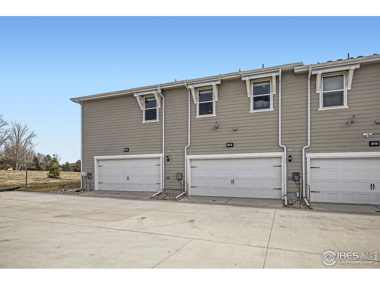 141 Robin Road Johnstown, CO 80534 - Photo 22 of 38 Exterior Rear 2 car attached garage