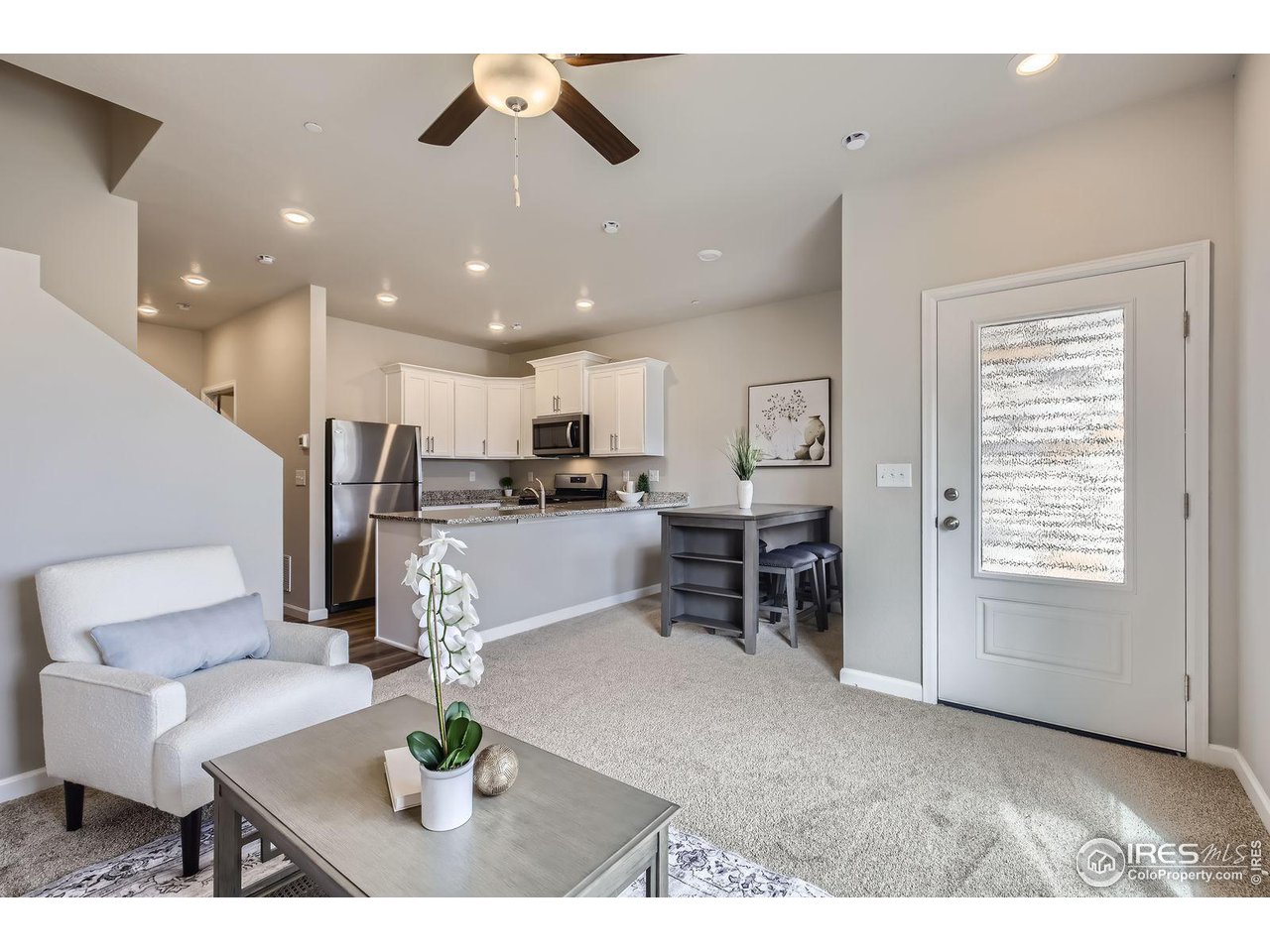 141 Robin Road Johnstown, CO 80534 - Photo 5 of 38 Kitchen Living Room
