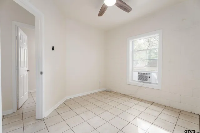 an empty room with windows