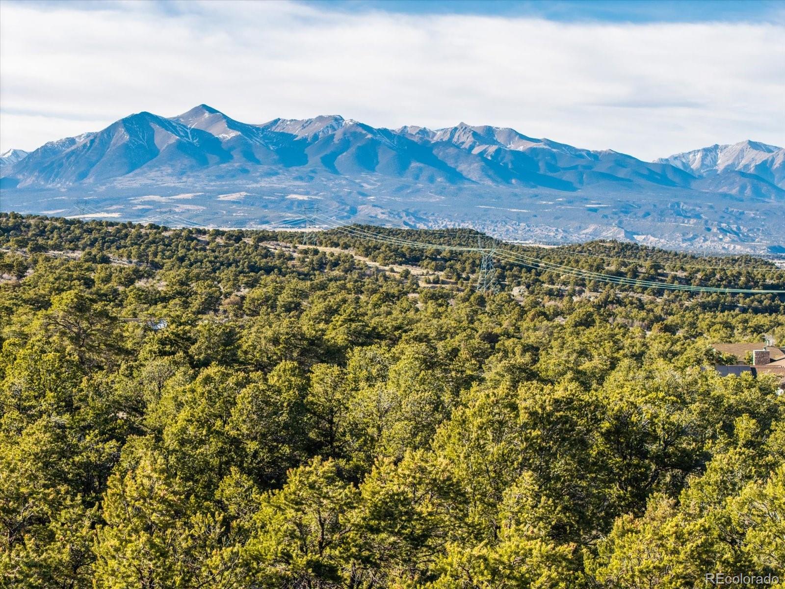 5450 Longbranch Road Salida, CO 81201 - Photo 3 of 28 a view of a mountain range with lush green forest