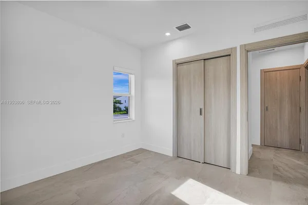 an empty room with windows