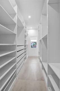 a view of an empty walk in closet