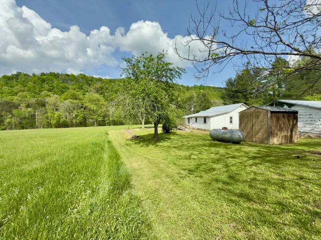 a view of an outdoor space and a yard