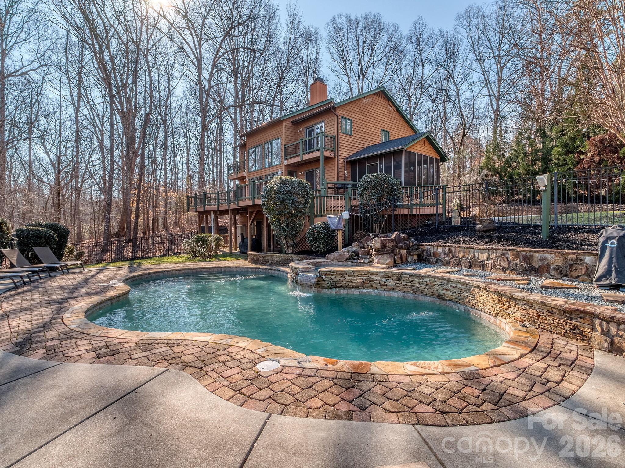 8723 Crestview Road Waxhaw, NC 28173 - Photo 31 of 33 a view of a house with swimming pool