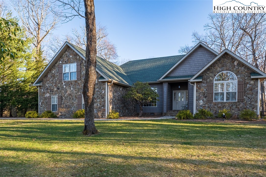 158 Northview Ridge Glade Valley, NC 28627 - Photo 1 of 27 a front view of a house with a yard