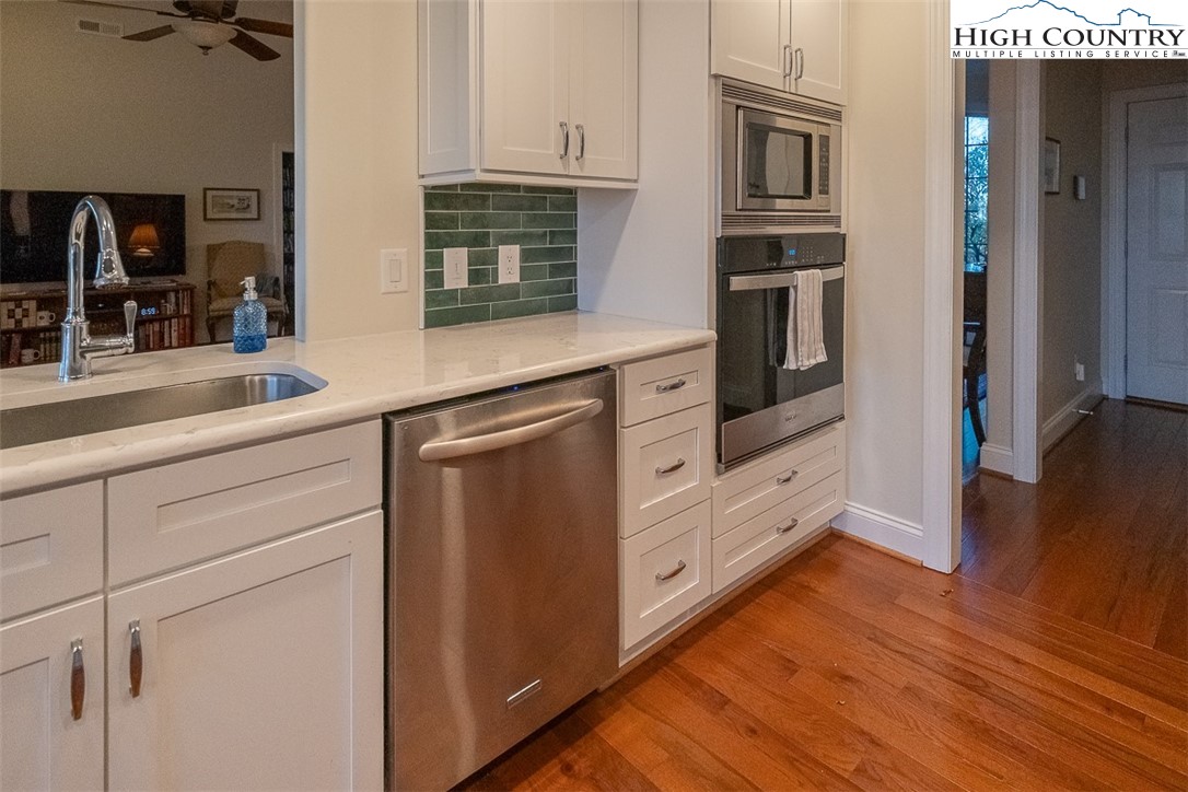 158 Northview Ridge Glade Valley, NC 28627 - Photo 11 of 27 a kitchen with stainless steel appliances granite countertop a stove and a refrigerator