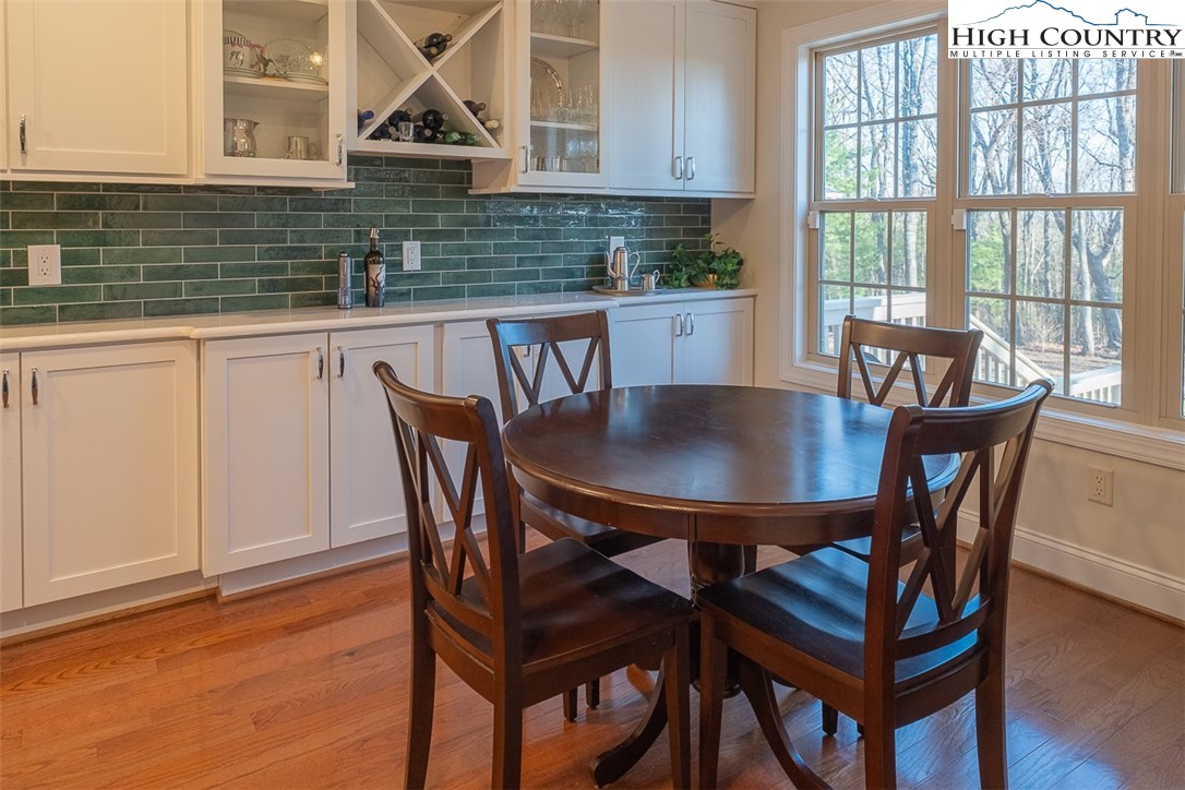 158 Northview Ridge Glade Valley, NC 28627 - Photo 13 of 27 a view of a dining room with furniture and window
