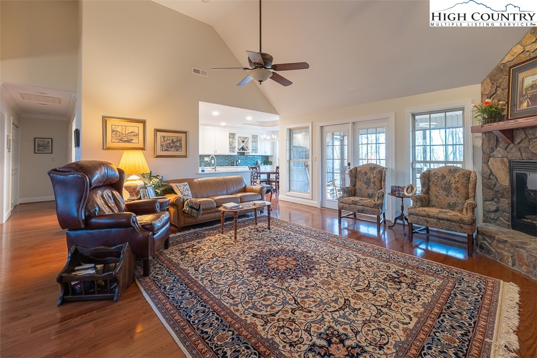 158 Northview Ridge Glade Valley, NC 28627 - Photo 16 of 27 a living room with furniture a rug and a fireplace