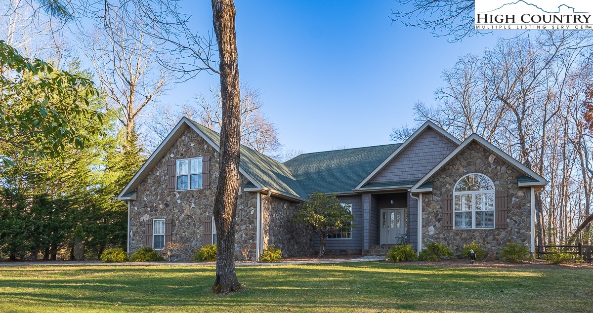 158 Northview Ridge Glade Valley, NC 28627 - Photo 27 of 27 a front view of a house with a yard