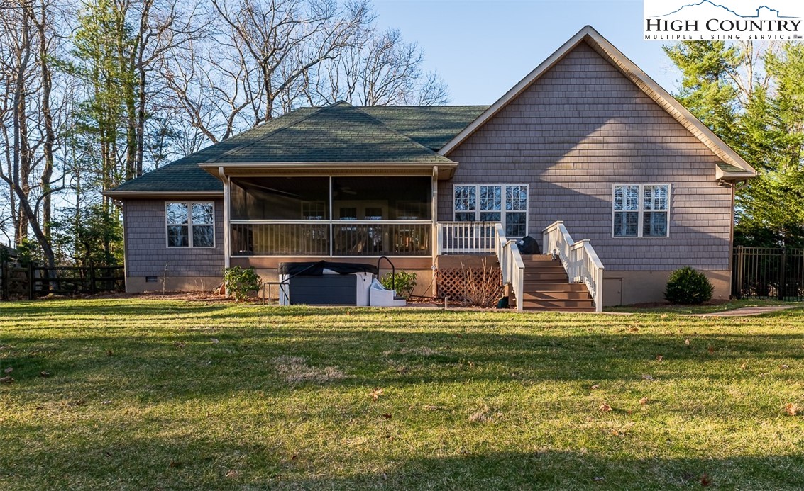 158 Northview Ridge Glade Valley, NC 28627 - Photo 4 of 27 a view of a house with a yard and sitting area
