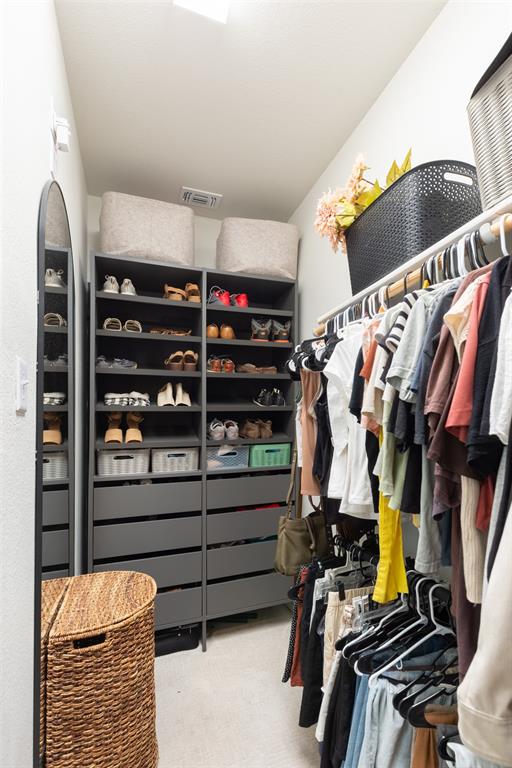 3105 Marston Road Lorena, TX 76655 - Photo 19 of 40 Custom closet system featuring built-in shelving, multiple drawers, and hanging rods