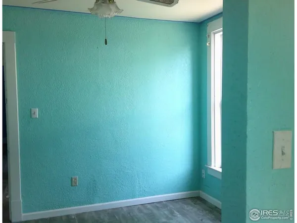 a view of a livingroom with a fan