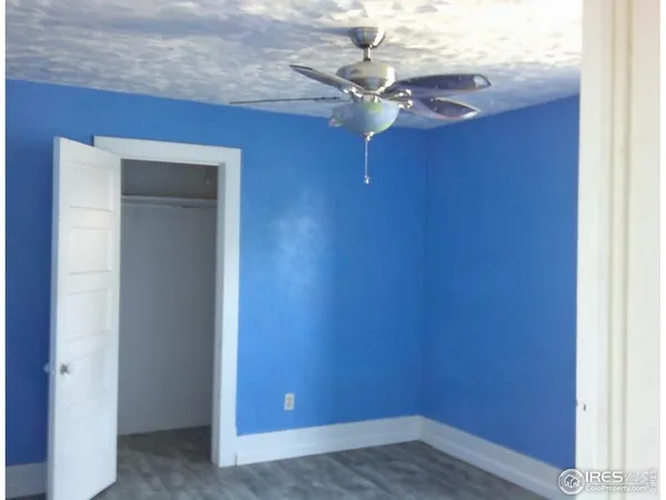 an empty room with closet