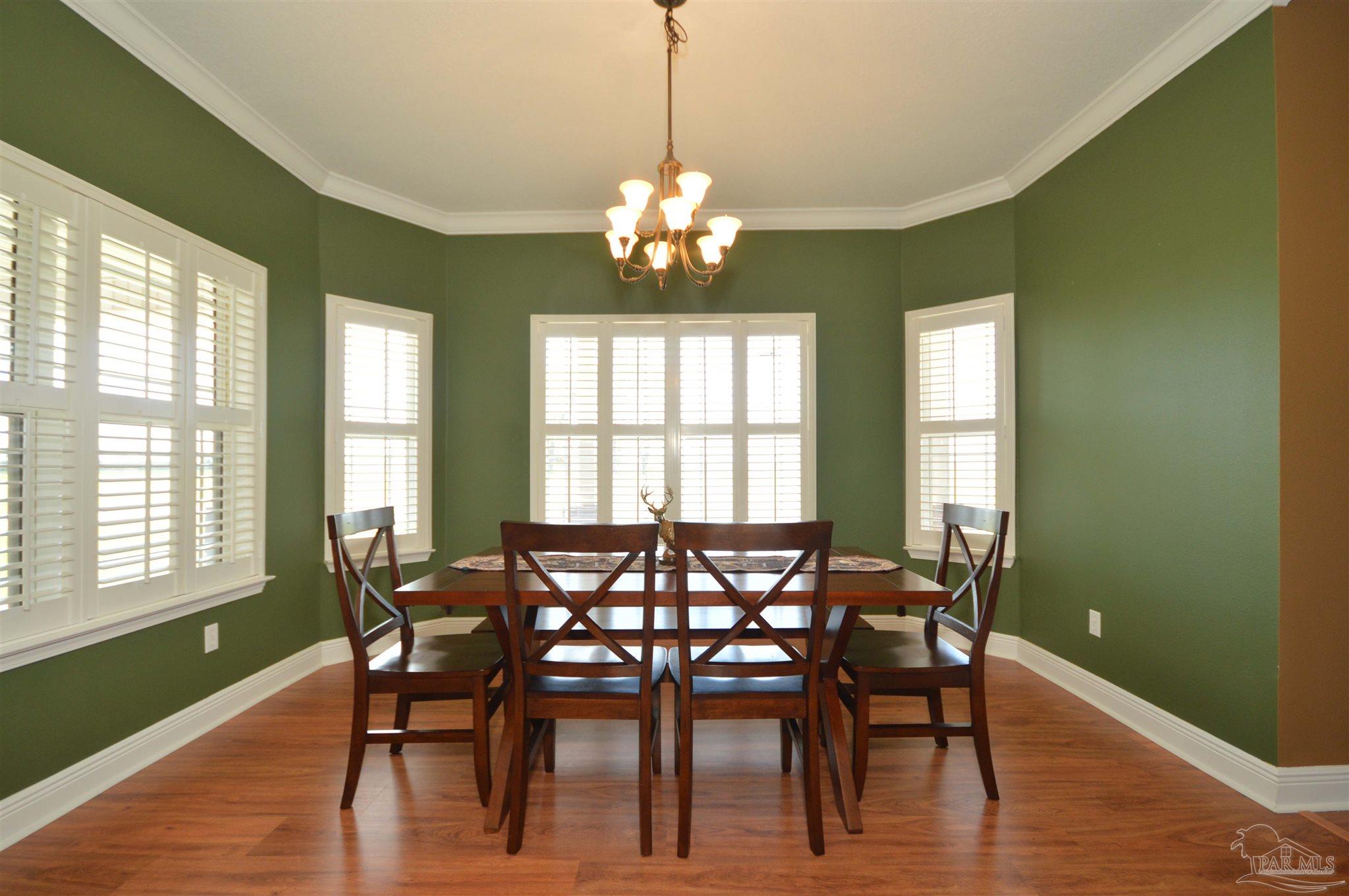 3478 Pine Level Church Road Jay, FL 32565 - Photo 25 of 50 a view of a dining room with furniture window and outside view