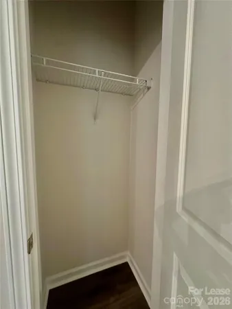 a view of an empty walk in closet