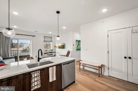 a kitchen with counter top space and sink