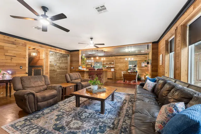 a view of living room next to a window