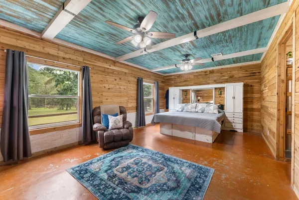 a view of living room next to a window