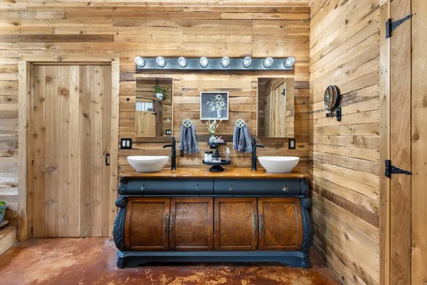 a bathroom with a toilet and shower