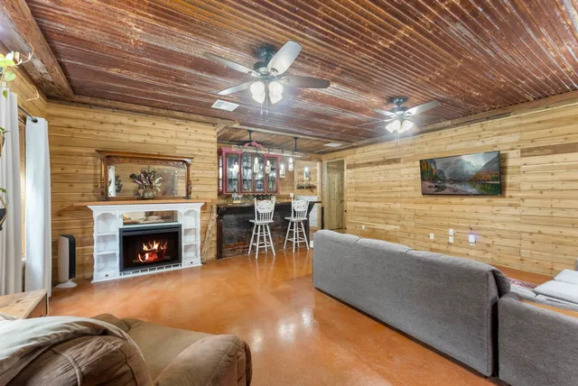 a kitchen with a sink appliances and cabinets