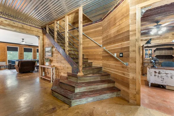 a view of entryway livingroom and hall