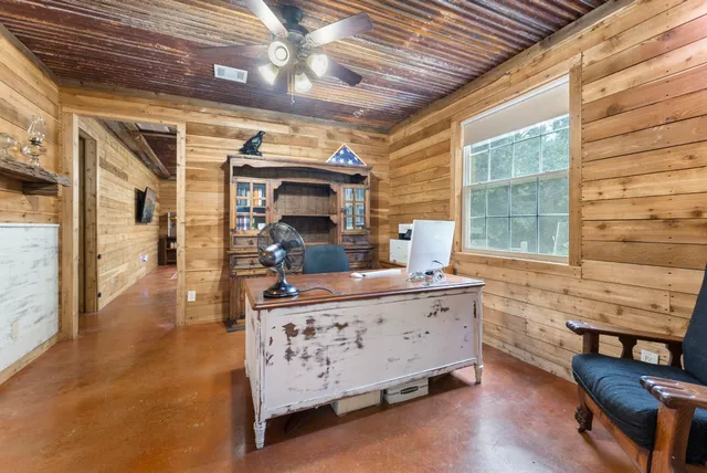 a room with furniture and a fireplace