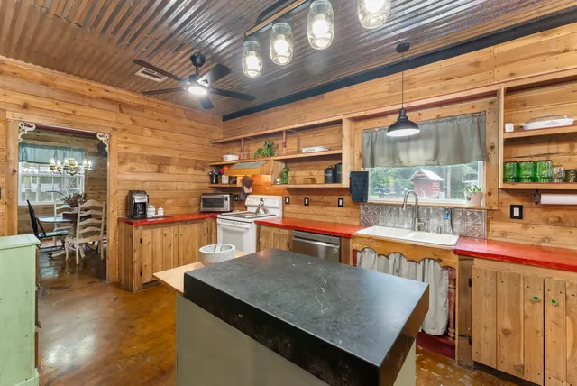 a living room with lots of tables and chairs