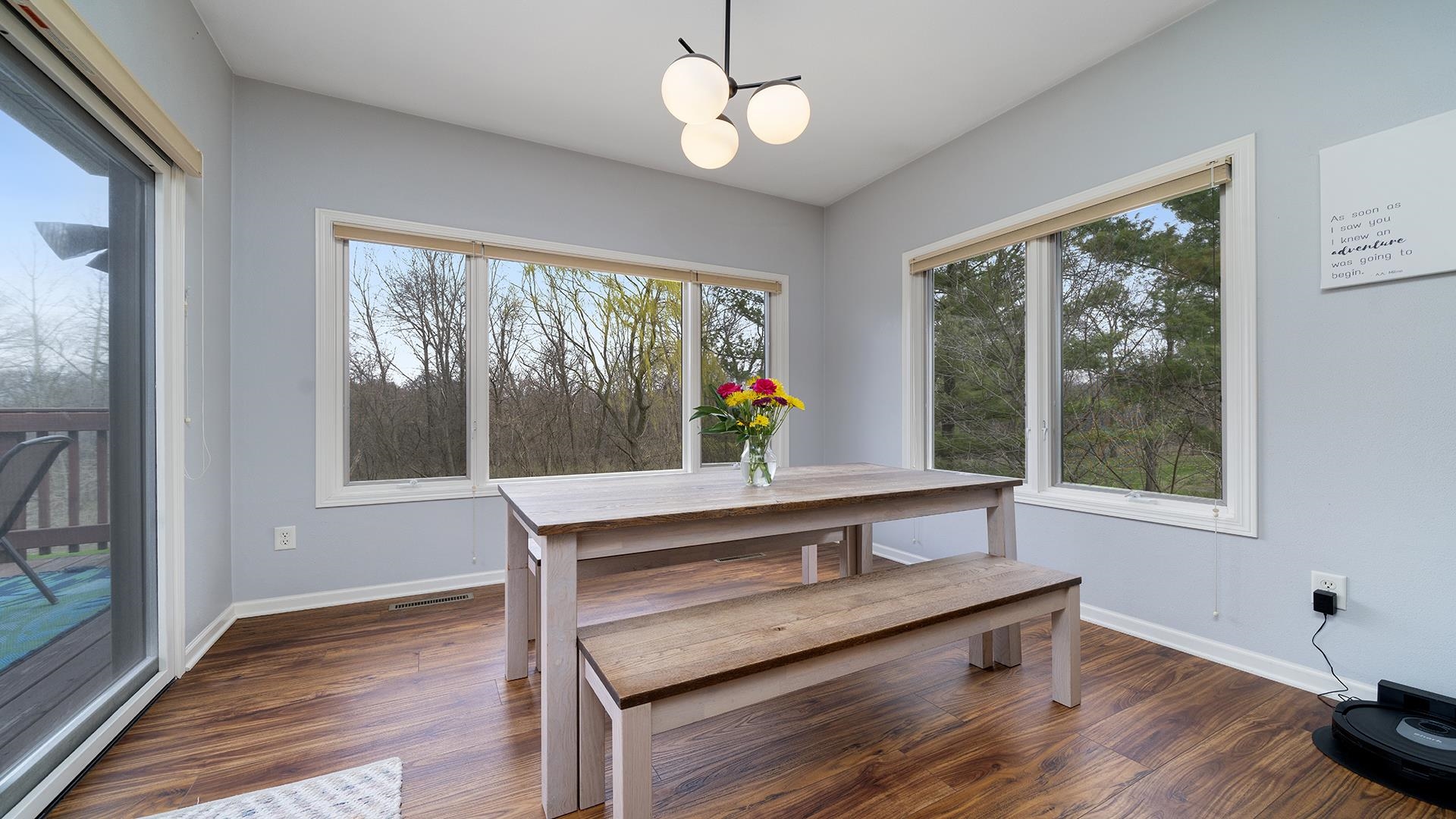 7676 Forest Way Roscoe, IL 61073 - Photo 14 of 56 a living room with furniture and a window
