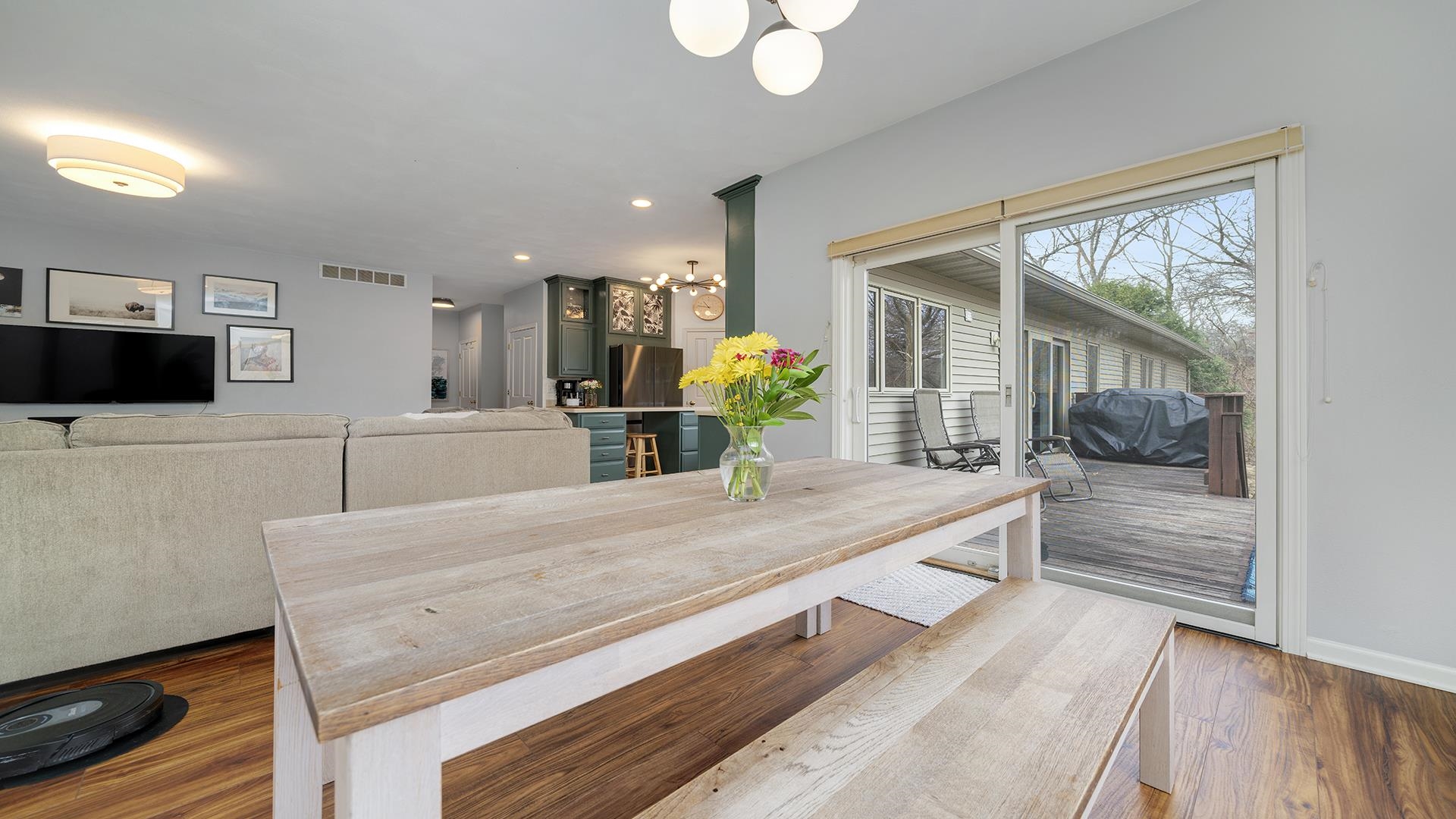 7676 Forest Way Roscoe, IL 61073 - Photo 15 of 56 a kitchen with counter top space and wooden floor