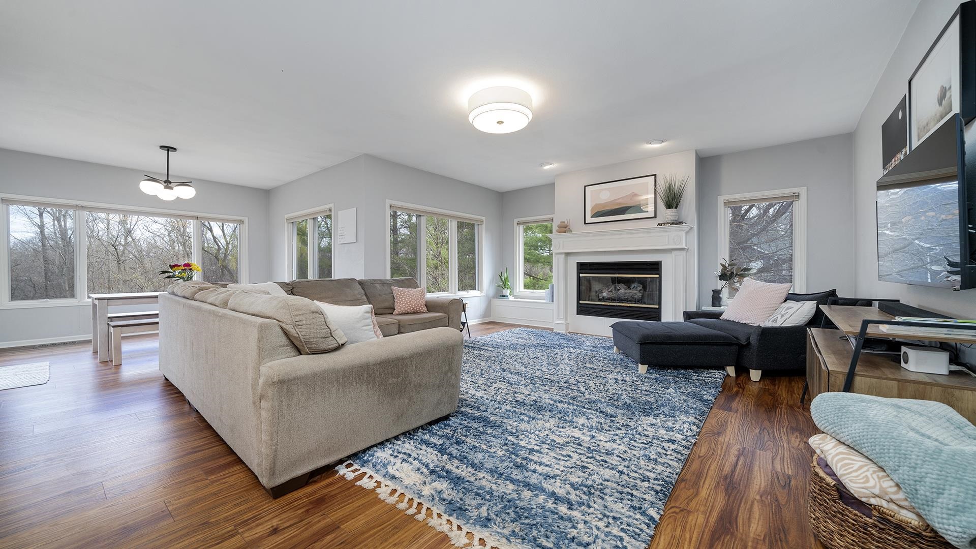7676 Forest Way Roscoe, IL 61073 - Photo 20 of 56 a living room with furniture and a fireplace
