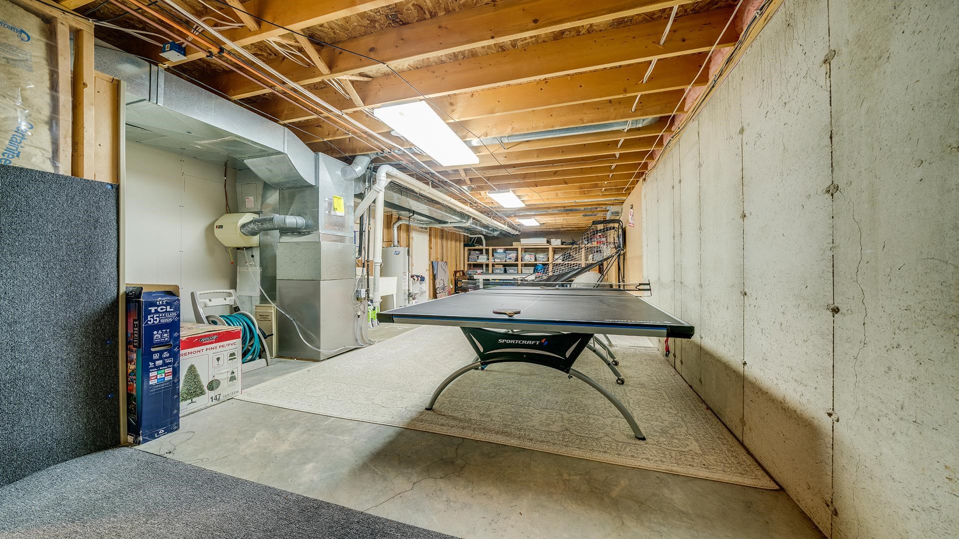 7676 Forest Way Roscoe, IL 61073 - Photo 48 of 56 a view of storage and utility room