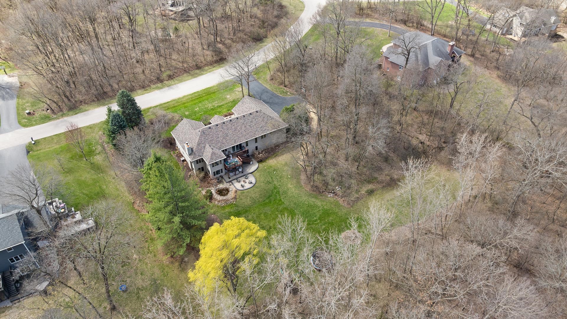 7676 Forest Way Roscoe, IL 61073 - Photo 56 of 56 a view of a house with a yard