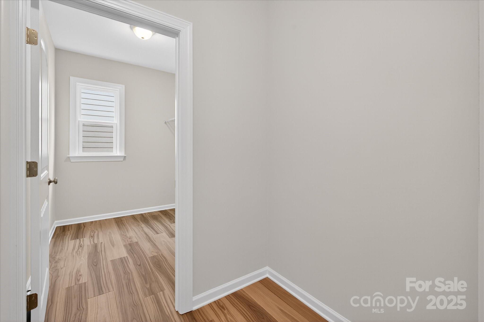 7926 Rolling Wheels Road, Unit KEN0008 Charlotte, NC 28215 - Photo 35 of 47 a view of a room that has a window in it