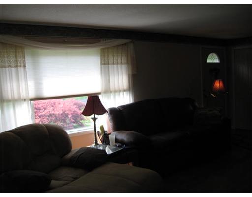 26 Gearing Road Monongahela, PA 15063 - Photo 11 of 18 Living Room. Large window in living room looks out over lovely landscaping.