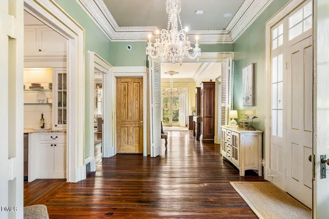 a bedroom with a bed and a fireplace