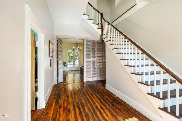 a kitchen with a stove a refrigerator and a sink