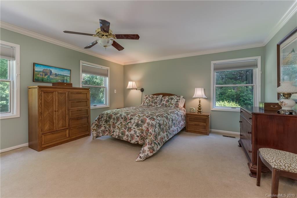 1790 Red Fox Road Tryon, NC 28782 - Photo 11 of 40 a bedroom with a bed and with furniture