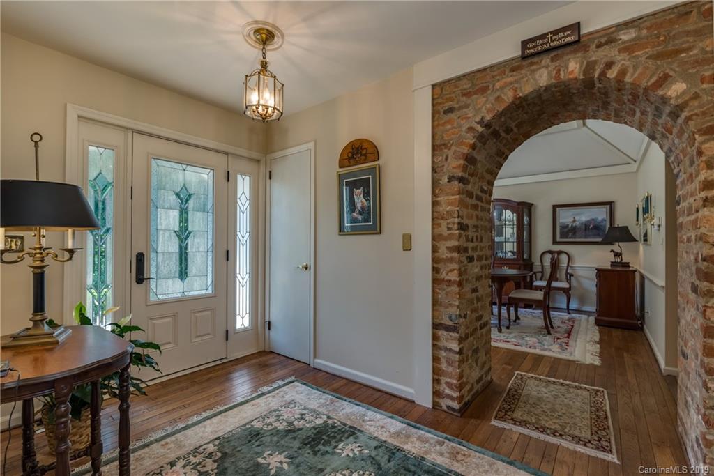 1790 Red Fox Road Tryon, NC 28782 - Photo 3 of 40 a view of a livingroom with furniture window and wooden floor