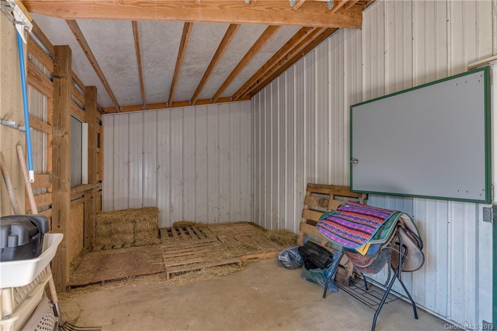 1790 Red Fox Road Tryon, NC 28782 - Photo 22 of 40 a backyard of a house with table and chairs