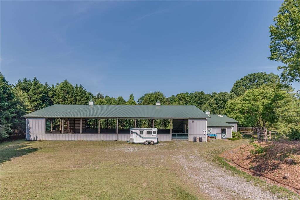 1790 Red Fox Road Tryon, NC 28782 - Photo 23 of 40 front view of a house with a big yard